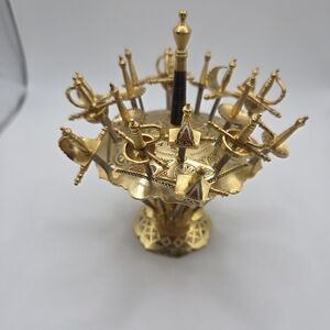 Gold and Black Decorative Sword Holder